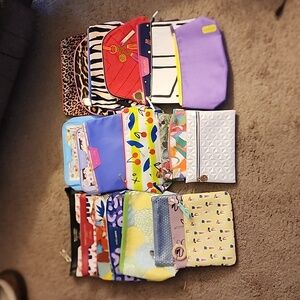 Assortment of 23 medium to small make up bags